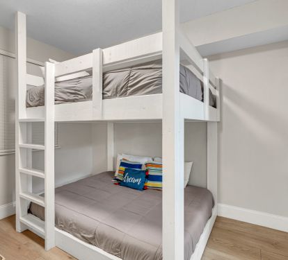 Spacious bunk room with queen-over-queen + trundle.