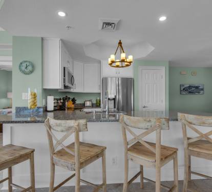 Kitchen has stainless steel appliances, pantry closet &amp; under cabinet lighting.