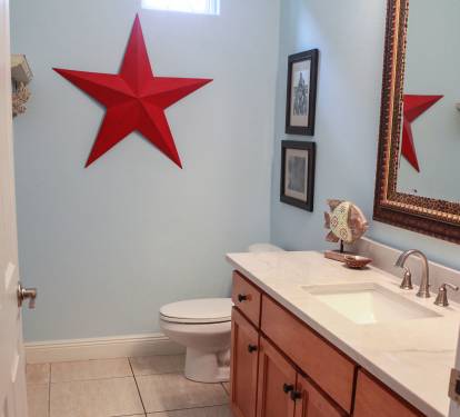 Full size bath on main level with new quartz countertop