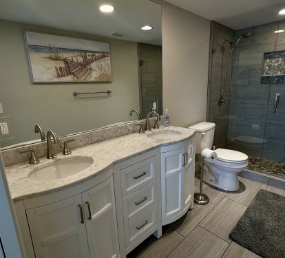 Master bathroom with dual sinks and walk in tile shower!