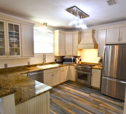 Gourmet kitchen with stainless appliances, gas range, and convection oven