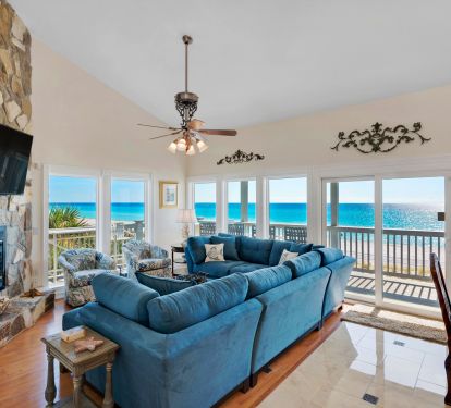 Family room with 65-inch smart TV, sectional, cathedral ceilings and fireplace