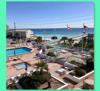 Surfside's pool deck has a beach road walkover.