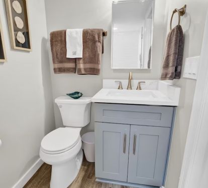 Upstairs bathroom with walk in shower.