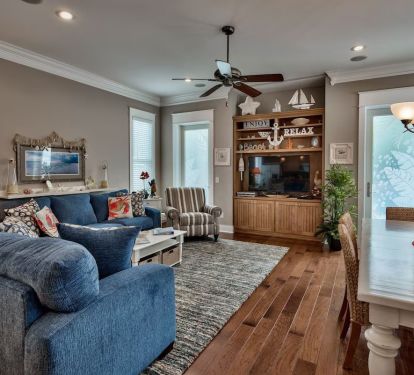 Spacious living room viewed from the entry hallway.