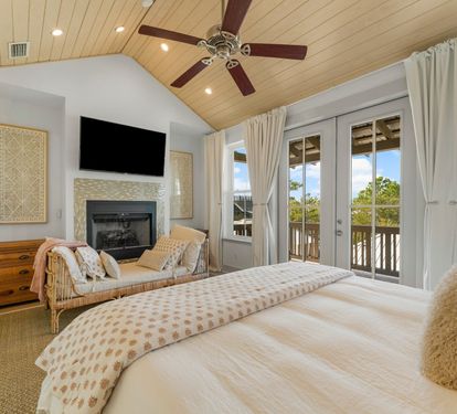 Top-floor Primary King Suite with fireplace and private balcony