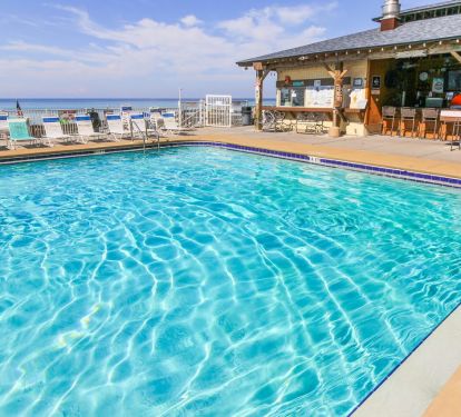 Bikini Bob's located between the two pools. Food, Drinks &amp; TV's - all poolside! 