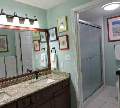 Primary en suite bathroom with beautiful walk in shower!