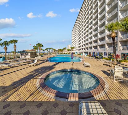 Two pools located beach side with kiddie pool.