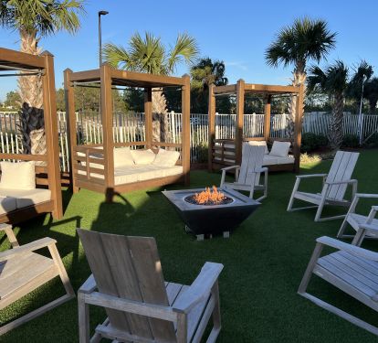 End the perfect day by relaxing around the Tower II Fire Pit!