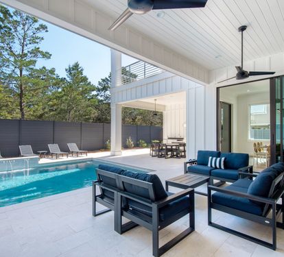  7ft x 7ft hot tub. The heated pool with tanning shelf on the pool and umbrella