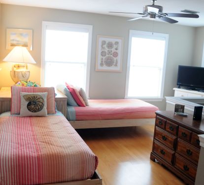 Two twin beds in the upstairs loft