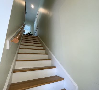 Stairs lead to the living space on the second floor