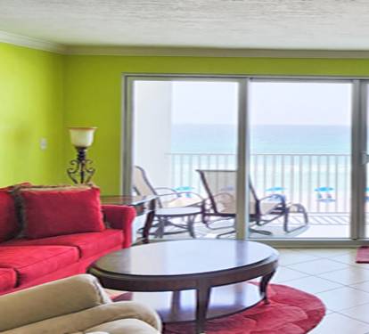 Large living area with 65" TV and Queen Sofa Sleeper