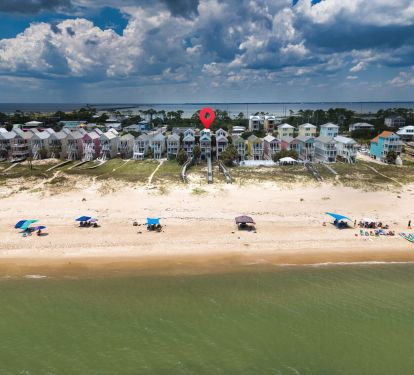 Drone View of Beach and Home