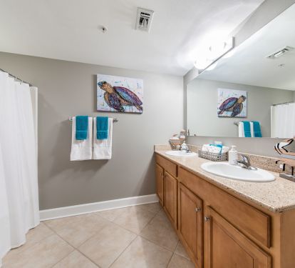 second bathroom attached to the guest queen bedroom.