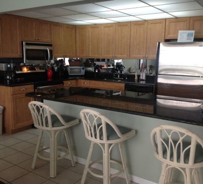 New cabinets, granite counters and stainless steel appliances