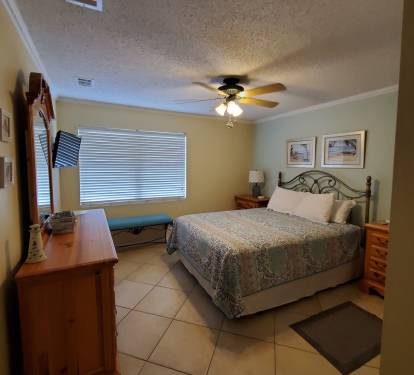 Master bedroom with queen bed and private ensuite.