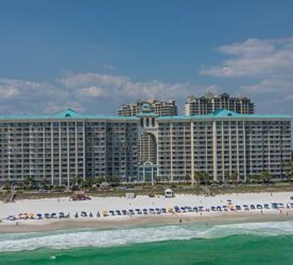Majestic Sun Steps Away From White Sandy Beach and Emerald Waters of the Gulf