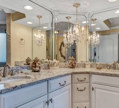 Master Bathroom with Granite Countertops and Wall of Mirrors