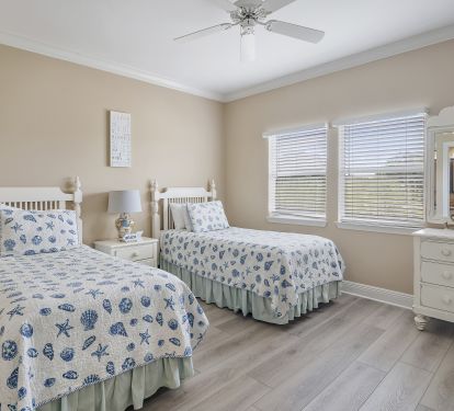 Upstairs guest BR has twin XL beds (can be converted to third king bed)