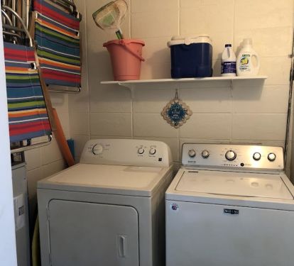 The laundry room has a full size washer/dryer. Beach essentials also stored here