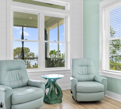 Comfortable leather swivel recliners and our Octopus Table!