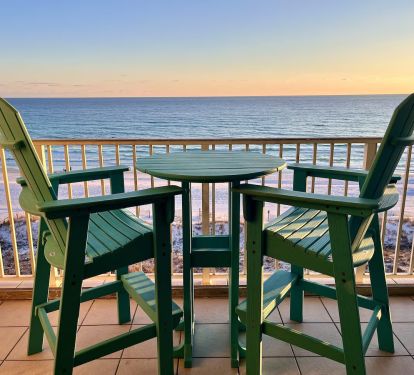 Sunset view from the high top chairs and table on the balcony!