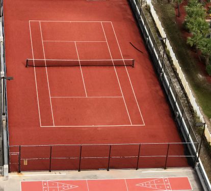 Free tennis court and shuffle board court are available for free guest use.
