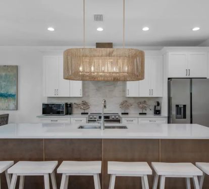 Driftwood-8  features a beautiful quartz island for grab-and-go meals, making beach outings effortless for your family!
