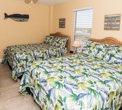 Guest Bedroom with two full beds and 32" TV