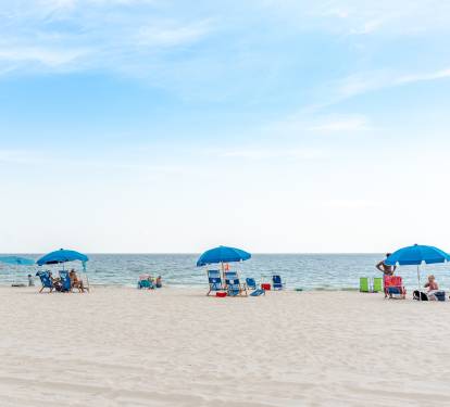 Beach at Sandpiper- chairs and umbrellas available for rent on beach