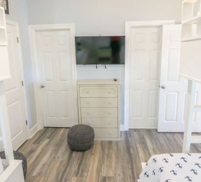Additional View of Custom Bunk Room with Ensuite Bath, TV