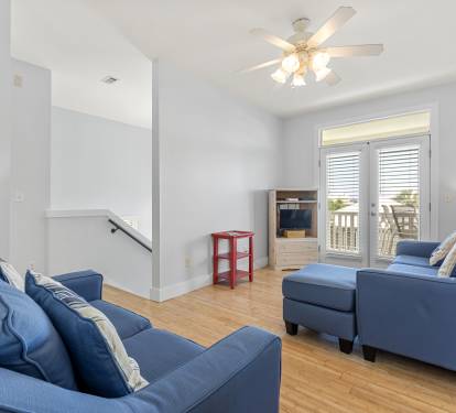 Upper level family room with TV/video games and balcony access
