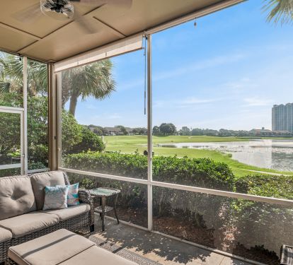 Porch off LR overlooking lake and golf course