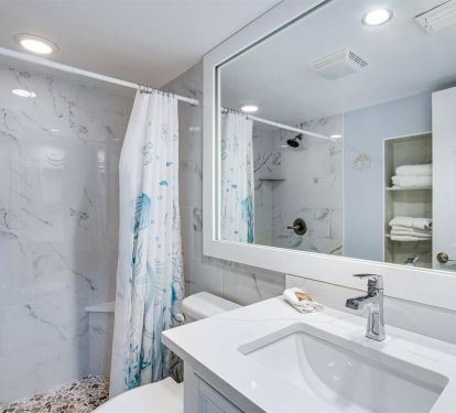 Bathroom with tiled shower