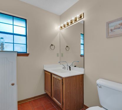 Half bath by the kitchen 