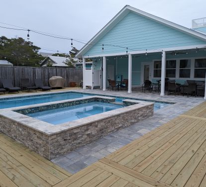 Backyard with lanai, pool and spa
