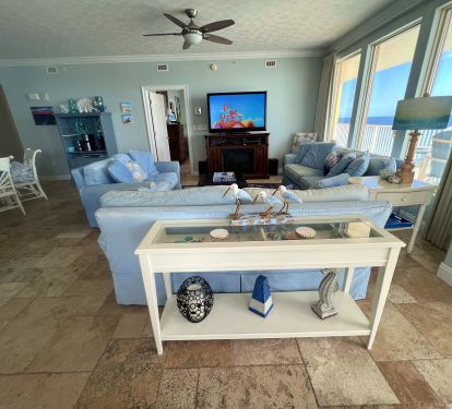 Living room with access to our wrap around balcony &amp; view of Gulf &amp; beach