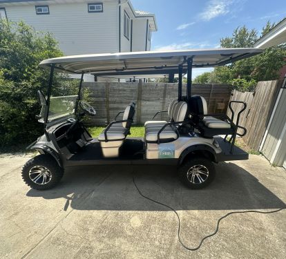 6 passenger golf cart included with weekly rental!