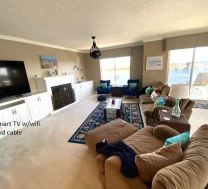 Eagles' Perch living room with wrap around balcony!  renteaglesperch.com