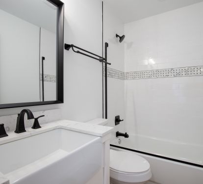 Ensuite bath has tub/shower combo.