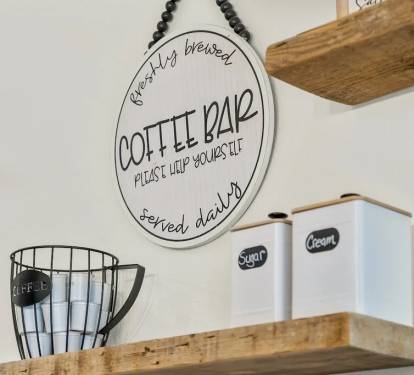 Full coffee bar with coffee, sugar, creamer and cups provided with your stay.