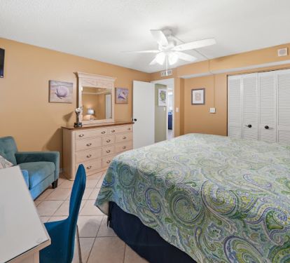 Front guest with king size bed with dresser &amp; 32 inch TV