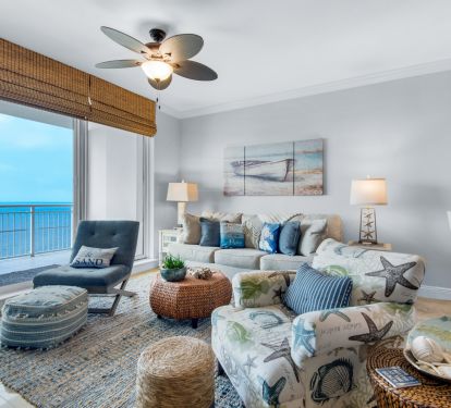 Bright, crisp living area with gulf front balcony 