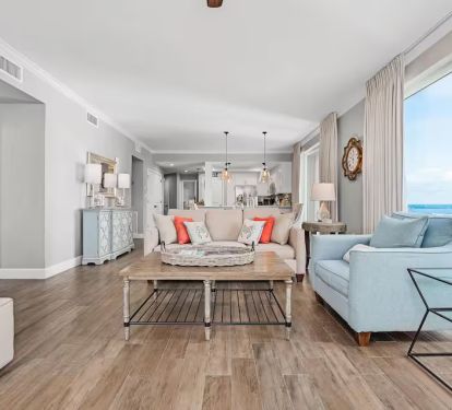 This beautifully renovated 12th floor unit impresses from end to end with its floor-to-ceiling windows throughout