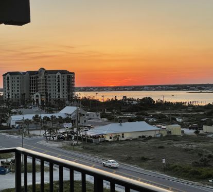 Sunset over the bayside view from private master balcony
