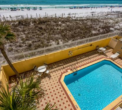 Property Pool with bathroom and outdoor shower.