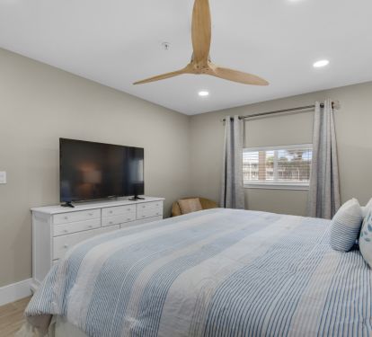 Master Bedroom has large smart tv