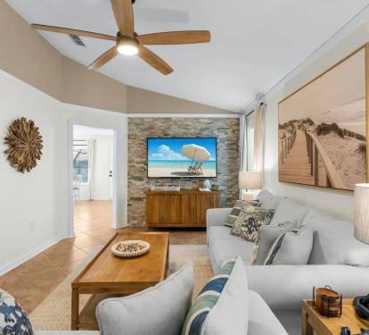 The living room of Serenity At Emerald Escape is a stylish oasis of comfort and relaxation.